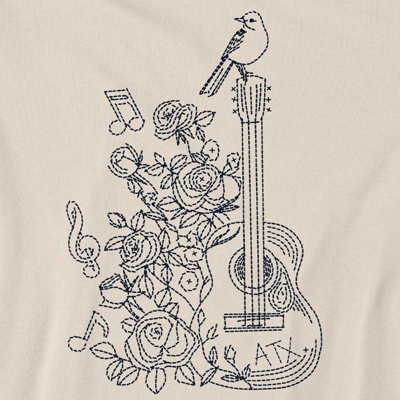 Embroidered design of a guitar, roses, and birds on a beige background