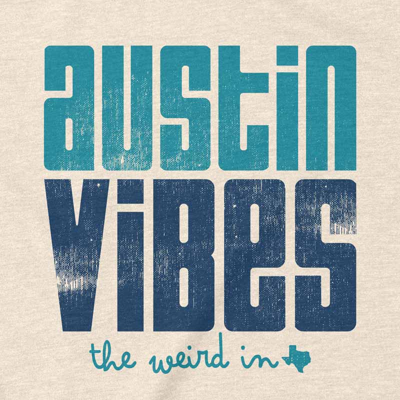 Close-up of vibrant Austin Vibes lettering and design elements on t-shirt