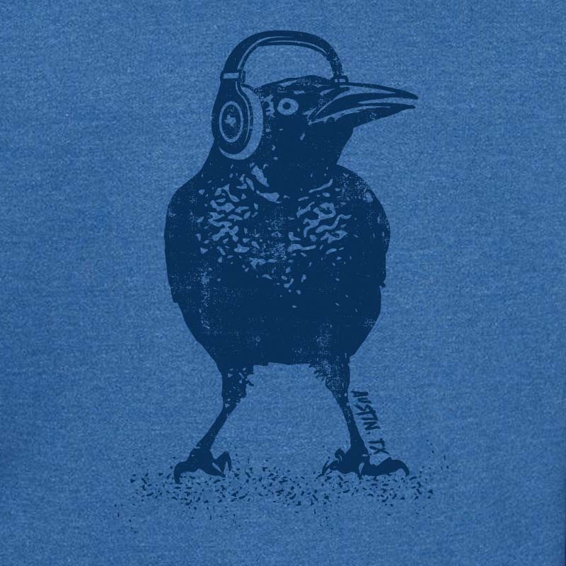 Blue crewneck sweatshirt featuring a bold graphic of a grackle bird wearing headphones, with the words 'Austin TX' in a fun, modern font. A playful nod to Austin's music scene and iconic city bird.