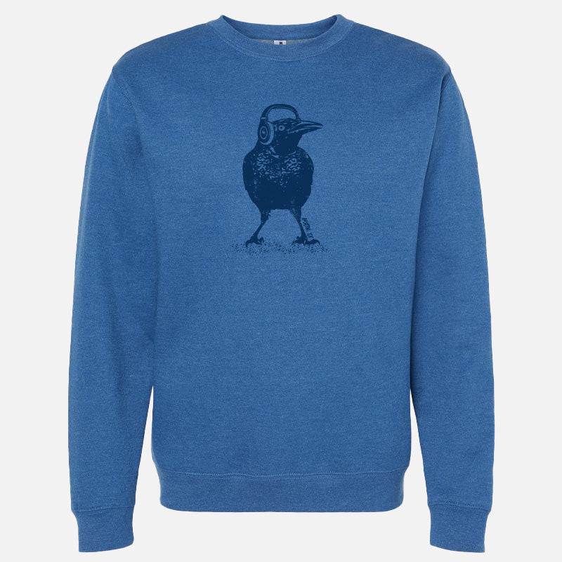 Blue crewneck sweatshirt featuring a bold graphic of a grackle bird wearing headphones, with the words 'Austin TX' in a fun, modern font. A playful nod to Austin's music scene and iconic city bird.