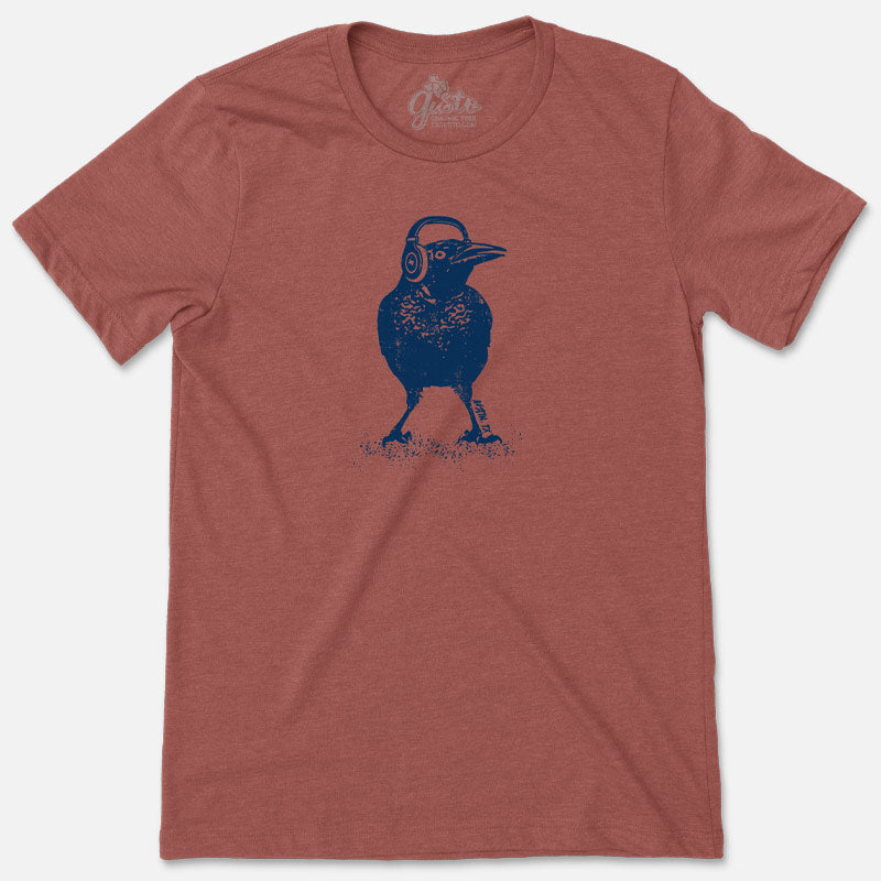 T-shirt featuring cartoon grackle wearing headphones with bold Austin design