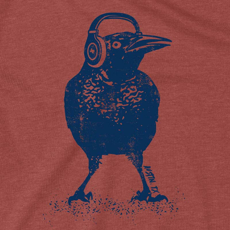 Close-up of grackle in headphones graphic printed on soft cotton fabric