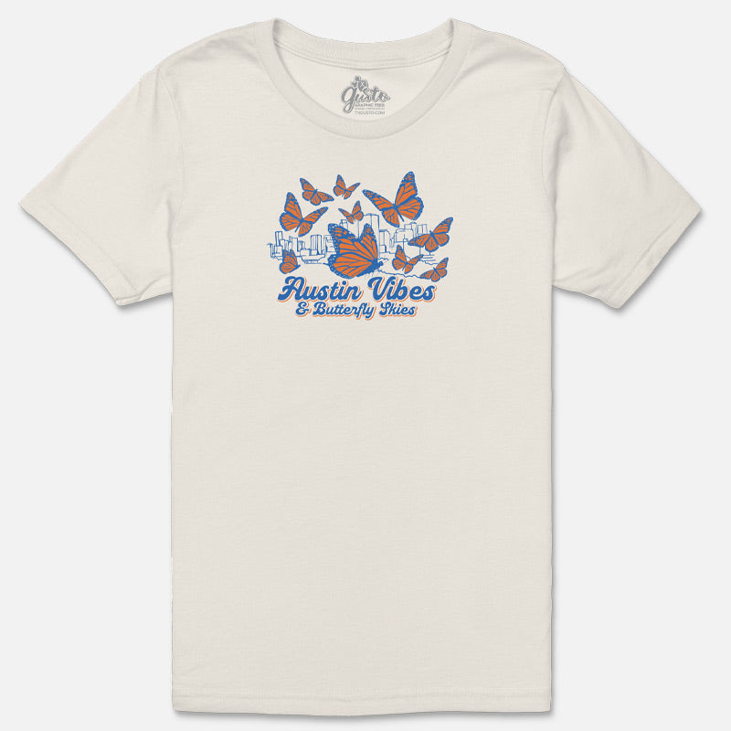 Beige t-shirt with 'Austin Vibes & Butterfly Vibes' design featuring butterflies and cityscape.