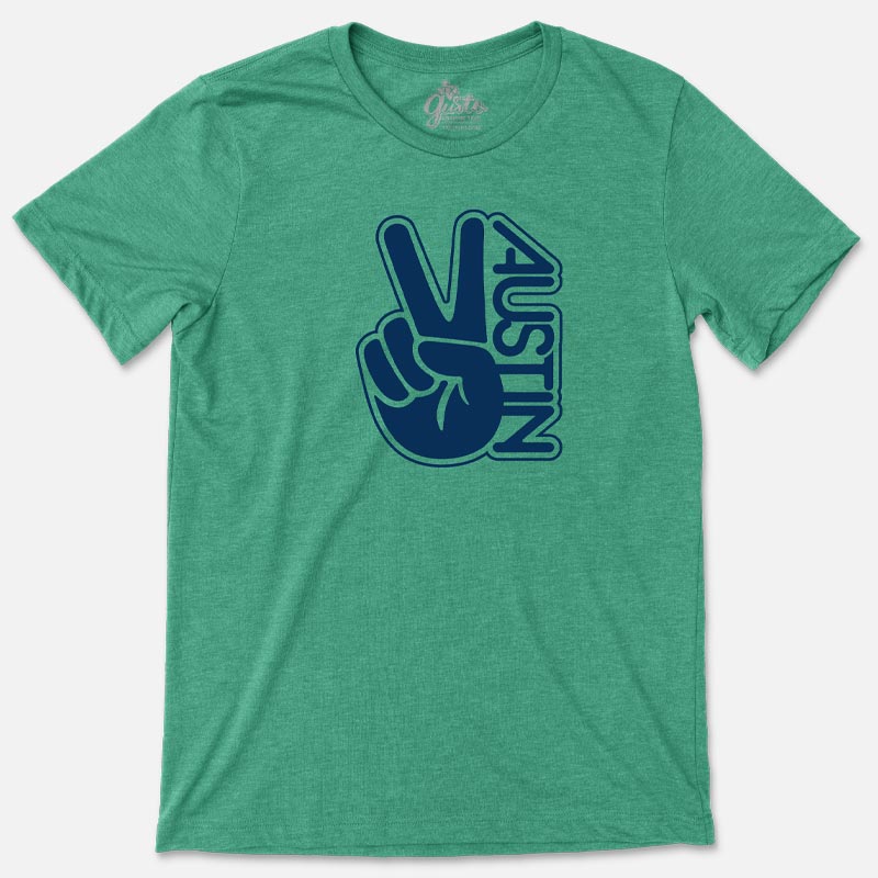 T-shirt with retro wavy “Austin” text and peace sign graphic in vibrant colors
