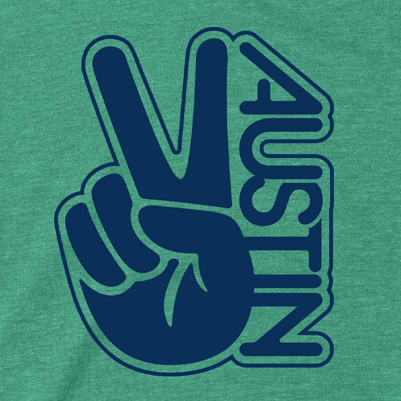 Close-up of colorful groovy “Austin” peace design printed on soft cotton fabric