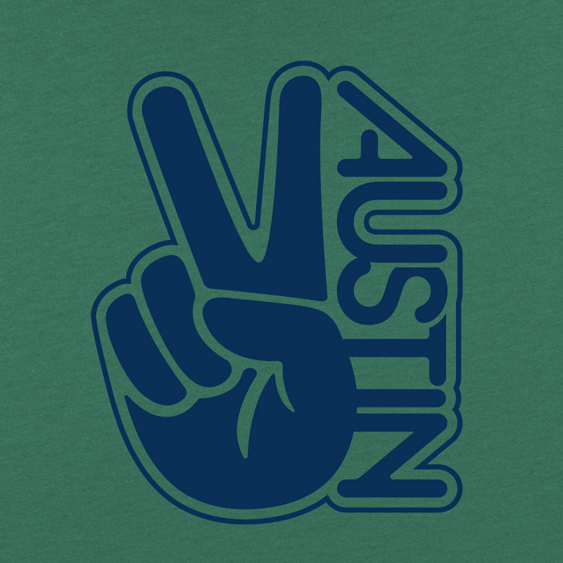 Close up of our Groovy Austin youth t-shirt with retro-inspired graphic – colorful and fun ATX tee for kids