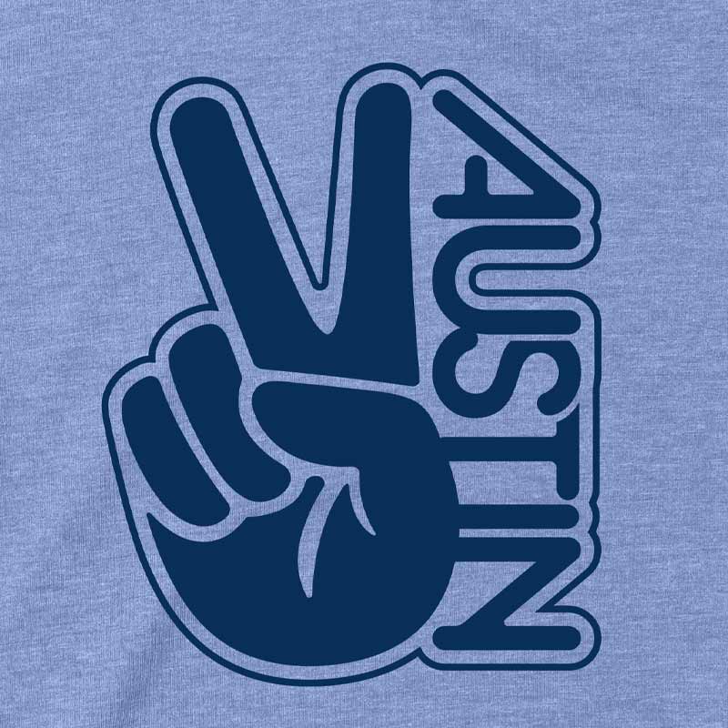 Close-up of colorful groovy “Austin” peace design printed on soft cotton fabric