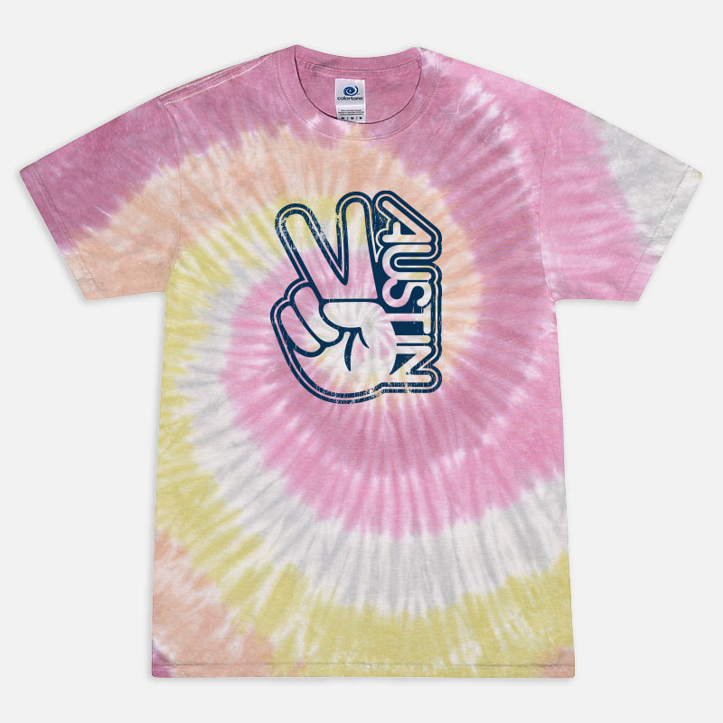 Tie-dye t-shirt with peace sign and 'Austin' design on a white background