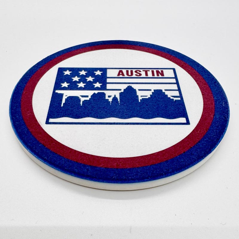 Coaster with Austin skyline design and American flag colors on a white background