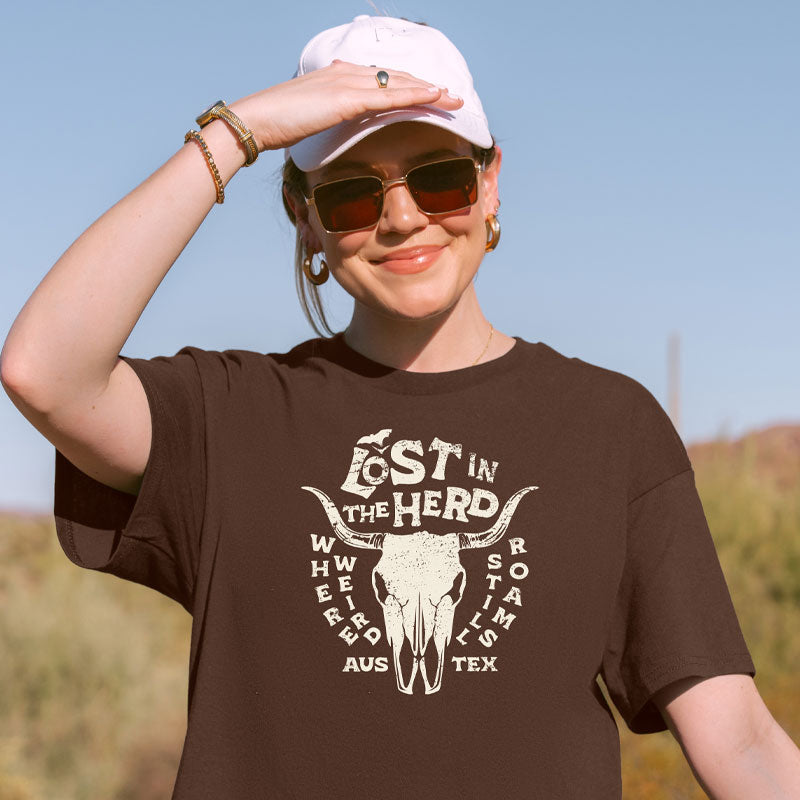 Unisex Austin graphic tee featuring Lost in the Herd phrase and western-style lettering