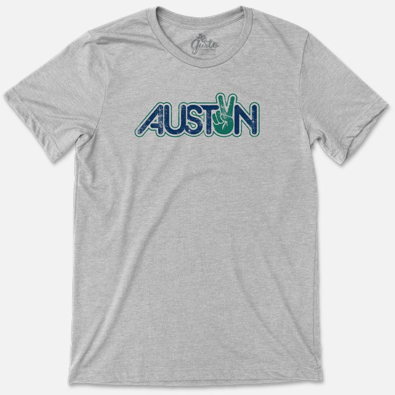 T-shirt with bold “Austin” text and peace sign graphic on soft cotton fabric