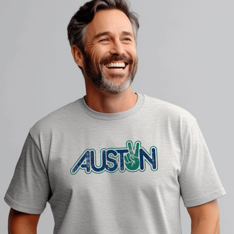 Model wearing Peace Austin T-shirt with simple and bold local design