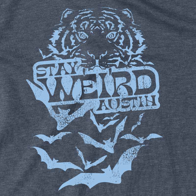 Close-up of “Stay Weird Austin” graphic print on breathable cotton material