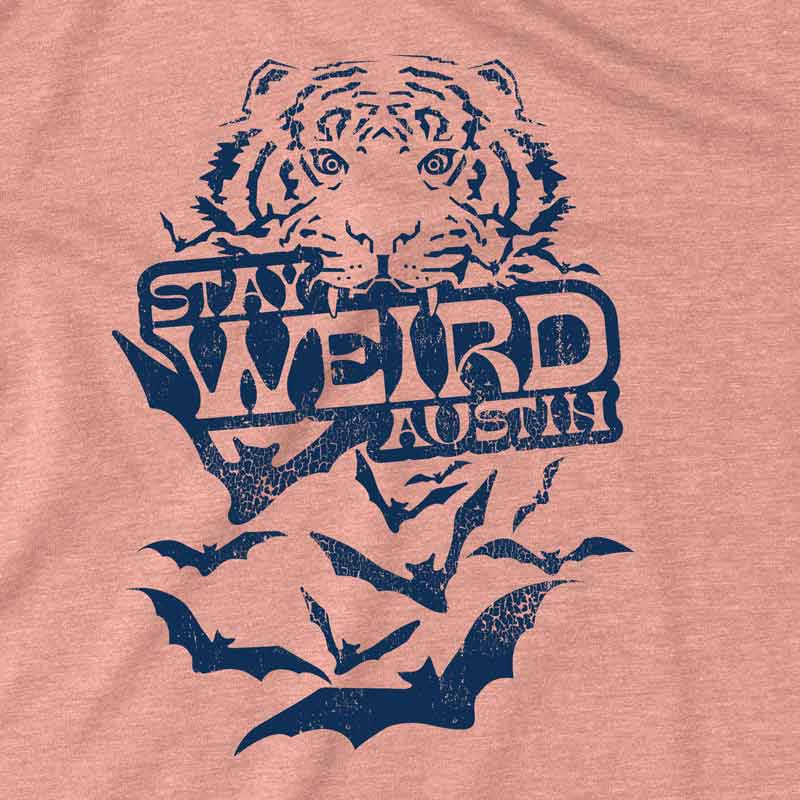 Close-up of “Stay Weird Austin” graphic print on breathable cotton material