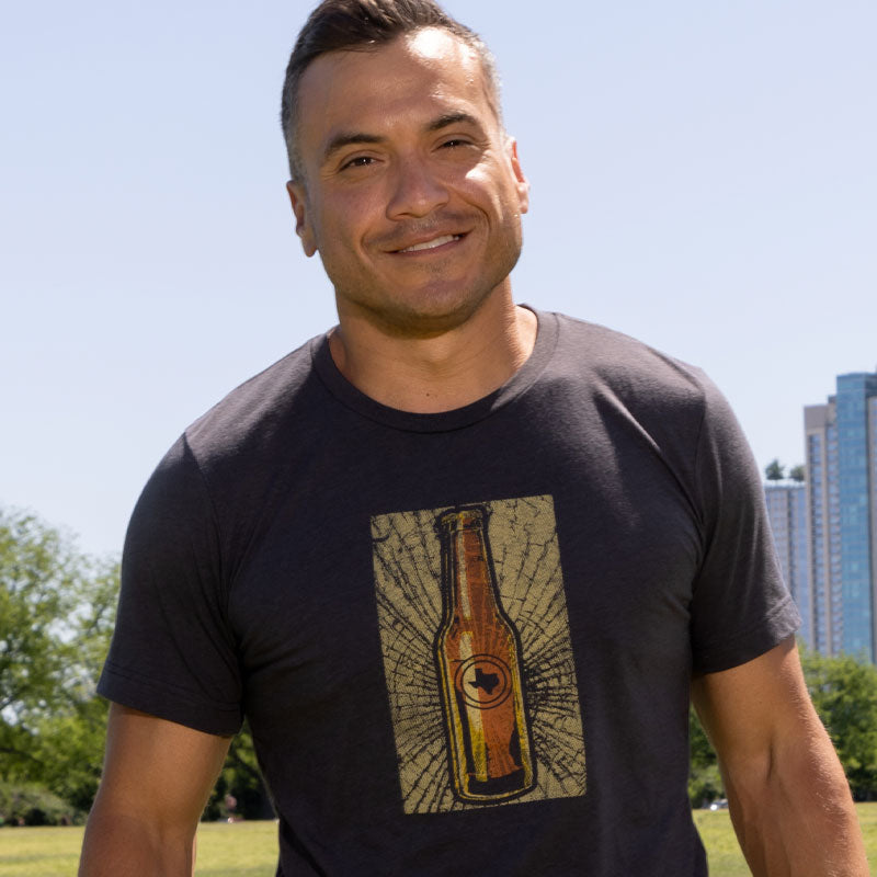 Model wearing TX Beer Break t-shirt – soft cotton tee with bold Texas-themed beer break graphic