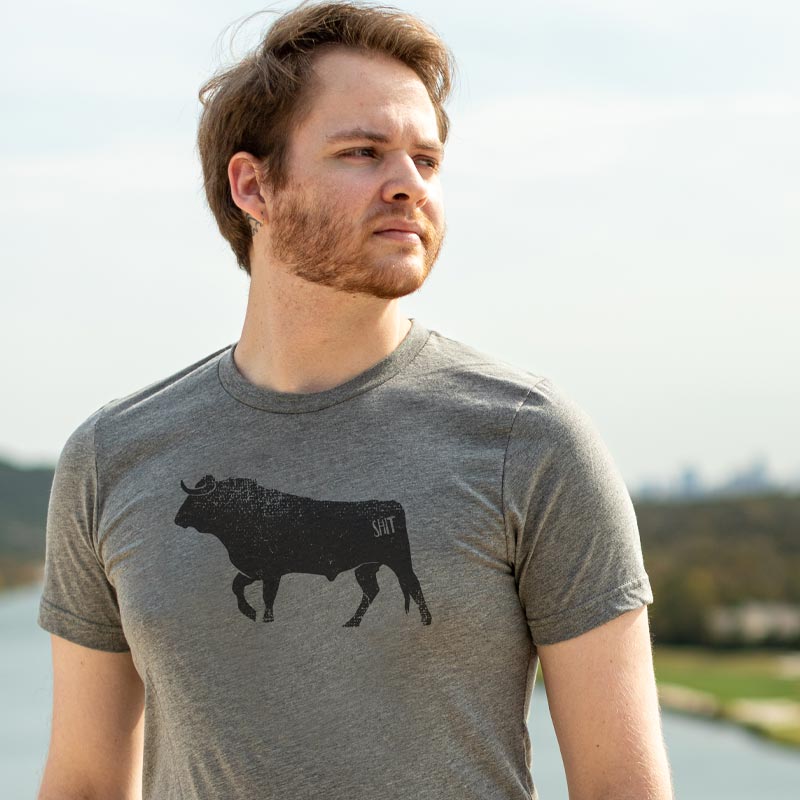 Model wearing Bullshit graphic t-shirt – bold vintage-style text design on soft cotton tee