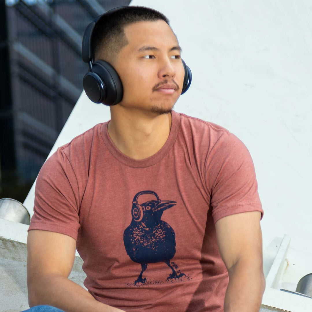 Austin Beats Grackle shirt with headphones-wearing bird