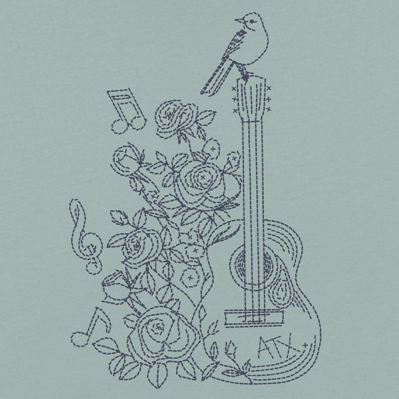 Embroidered design of a guitar, roses, and musical notes on a light blue background