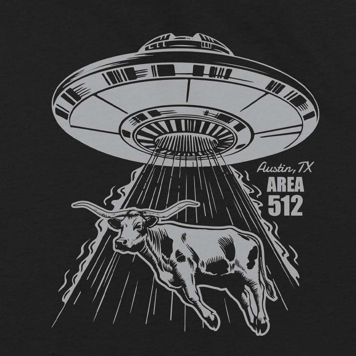 Black t-shirt with a graphic of a UFO abducting a texas longhorn, inspired by Area 512, on a white background.