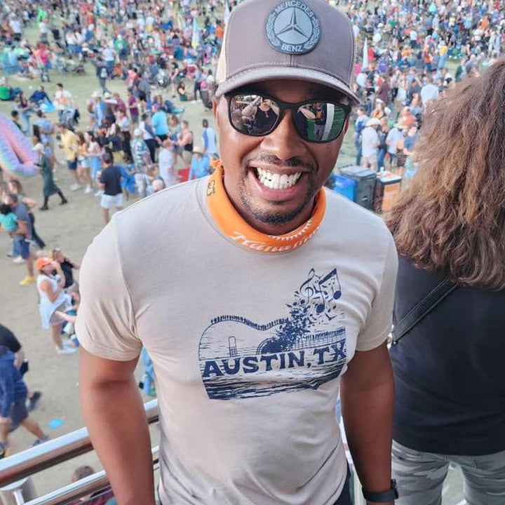 ATX Music Bridge T-shirt, Bats and Music Notes coming out of a guitar shaped bridge in Austin, Texas