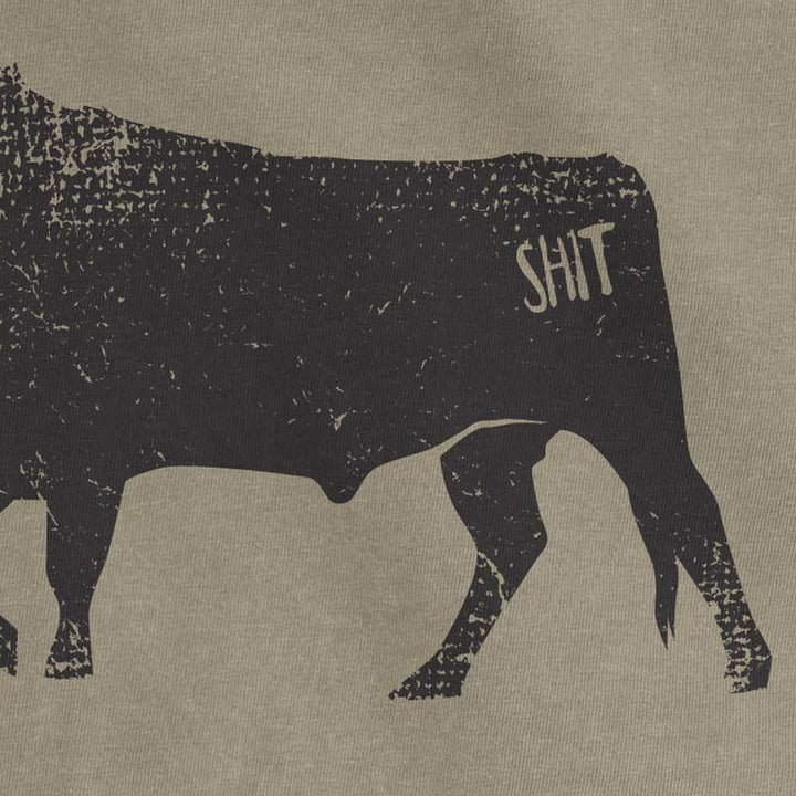 Silhouette of a cow with 'SHIT' on its side against a beige background