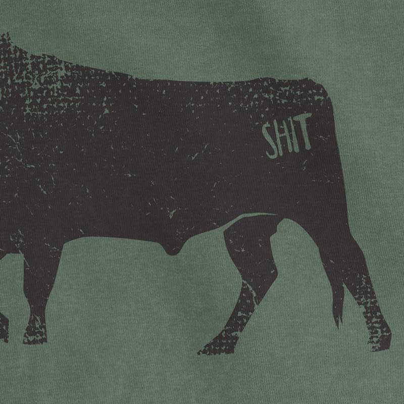 Silhouette of a cow with 'SHIT' on its side against a green background
