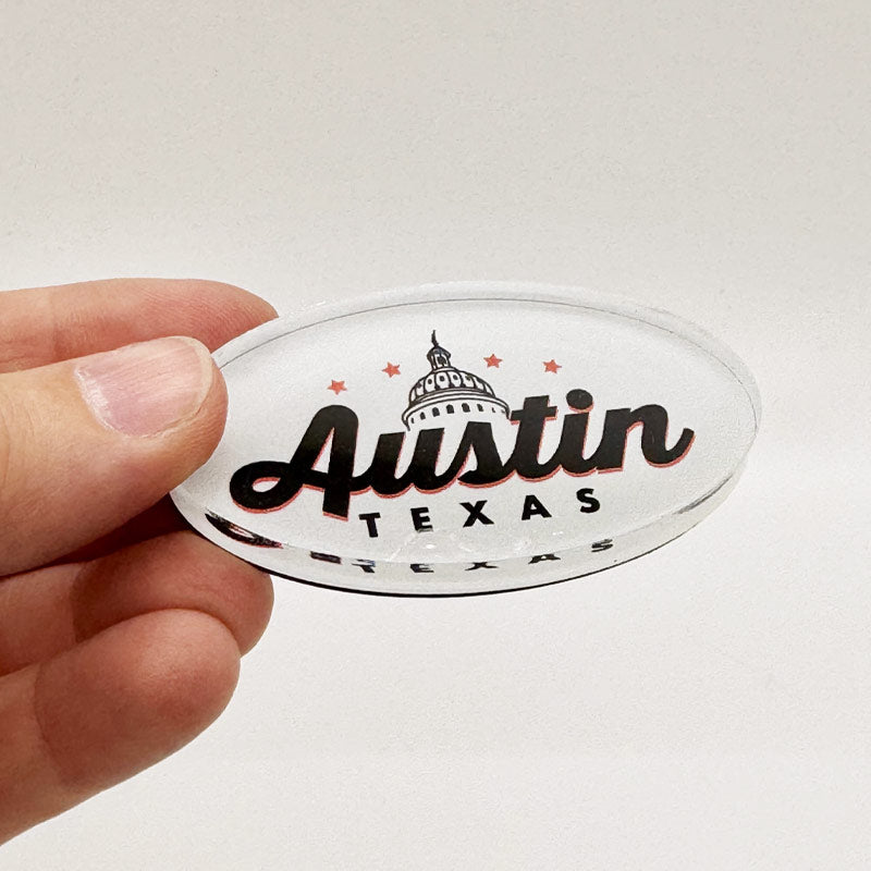 Side angle of Texas Capitol souvenir magnet showing durable acrylic layers