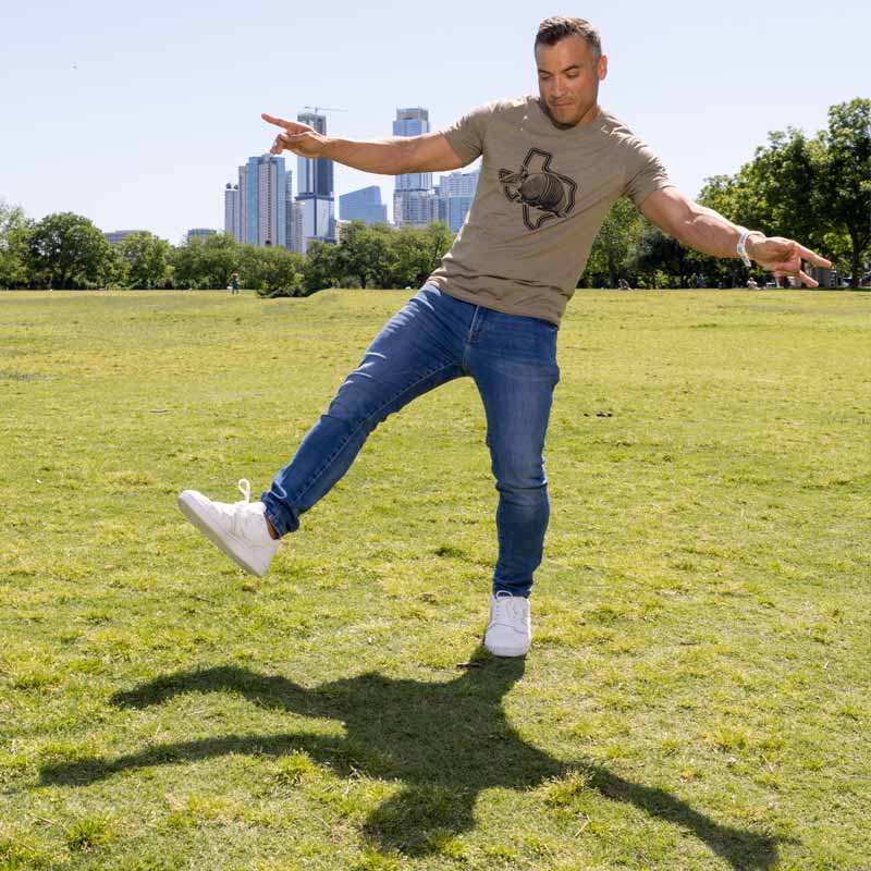 Model wearing Armadillo Texas t-shirt – soft cotton tee with fun graphic of Texas armadillo design