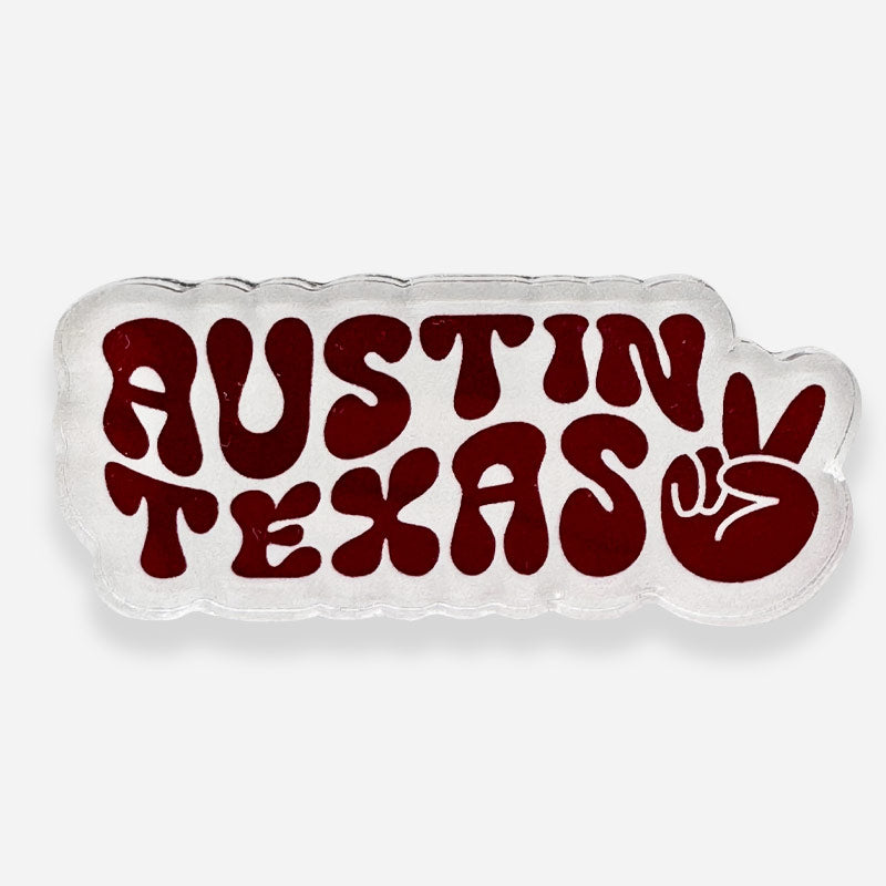 Funky Town acrylic magnet featuring wavy Austin, Texas text and peace sign in bold retro colors