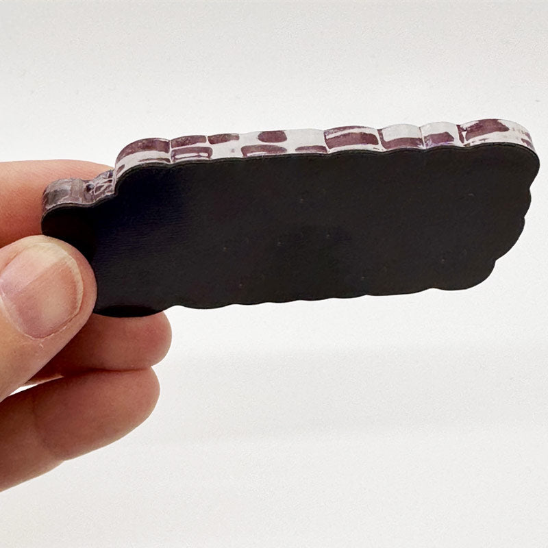 Side angle of Funky Town magnet showing .25-inch thick clear acrylic construction
