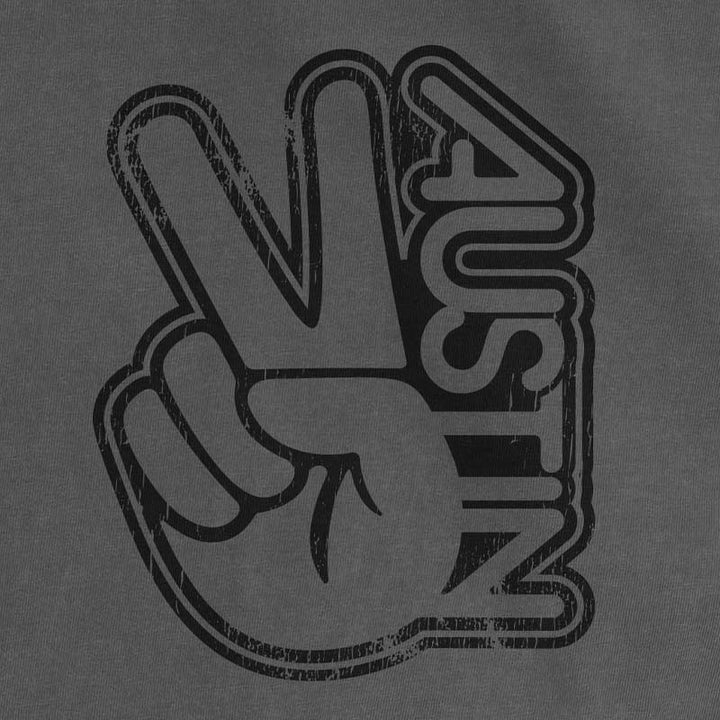 Black peace sign with 'Austin' on a gray background