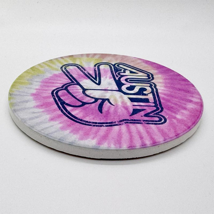 Tie-dye coaster with 'Peace Love Austin' design on a white background