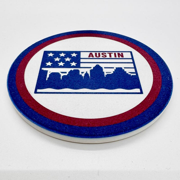 Coaster with Austin skyline design and American flag colors on a white background