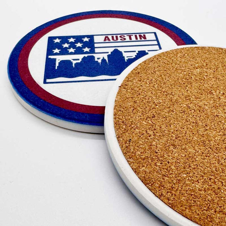Cork coaster with a design of an American flag and 'Austin' text on a white background