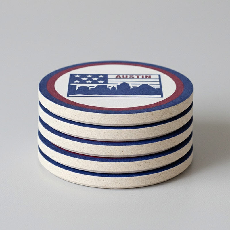 Stack of round coasters with a design featuring 'Austin' on a gray background