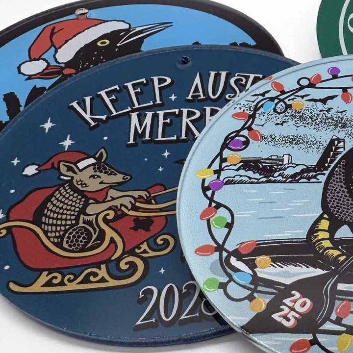 Three Christmas-themed ornaments with festive designs and &