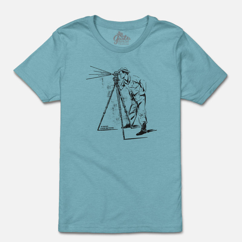 Youth t-shirt featuring vintage photo of man looking through a telescope with "Look Beyond" text – inspirational space-themed graphic on soft cotton tee.