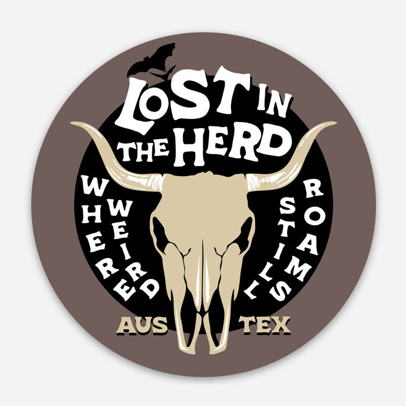 Circular sticker with a bull skull and text 'Lost in the Herd' on a brown background