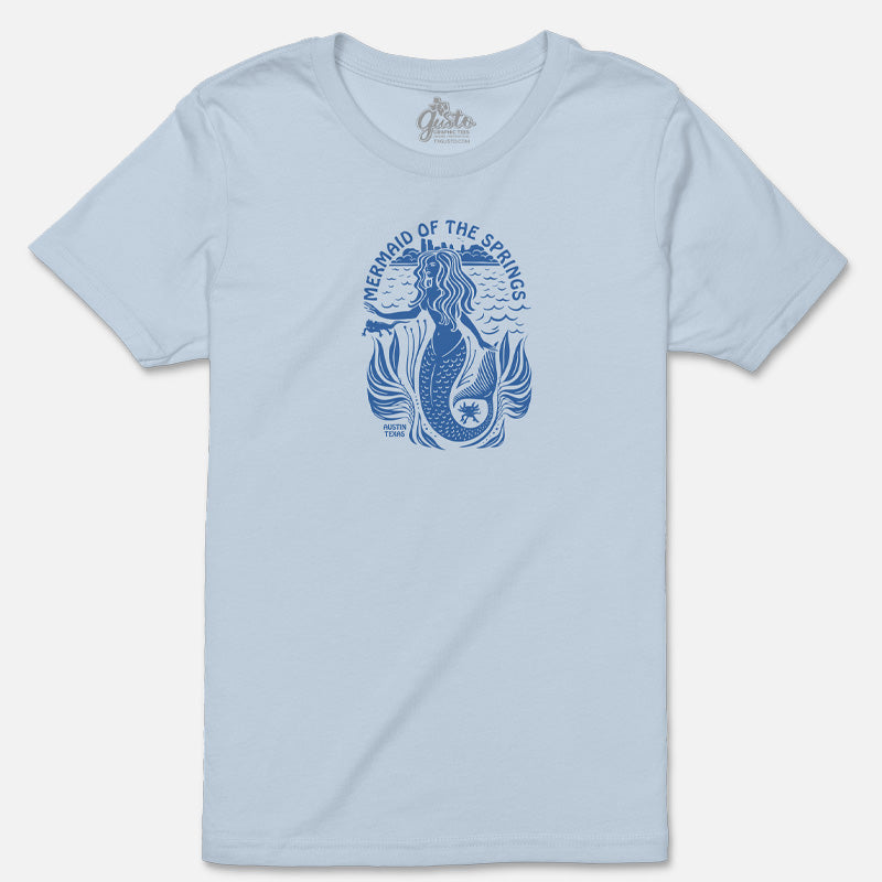 Flat lay of the Mermaid of the Springs Youth Tee showing the whimsical mermaid and Barton Springs salamanders design.