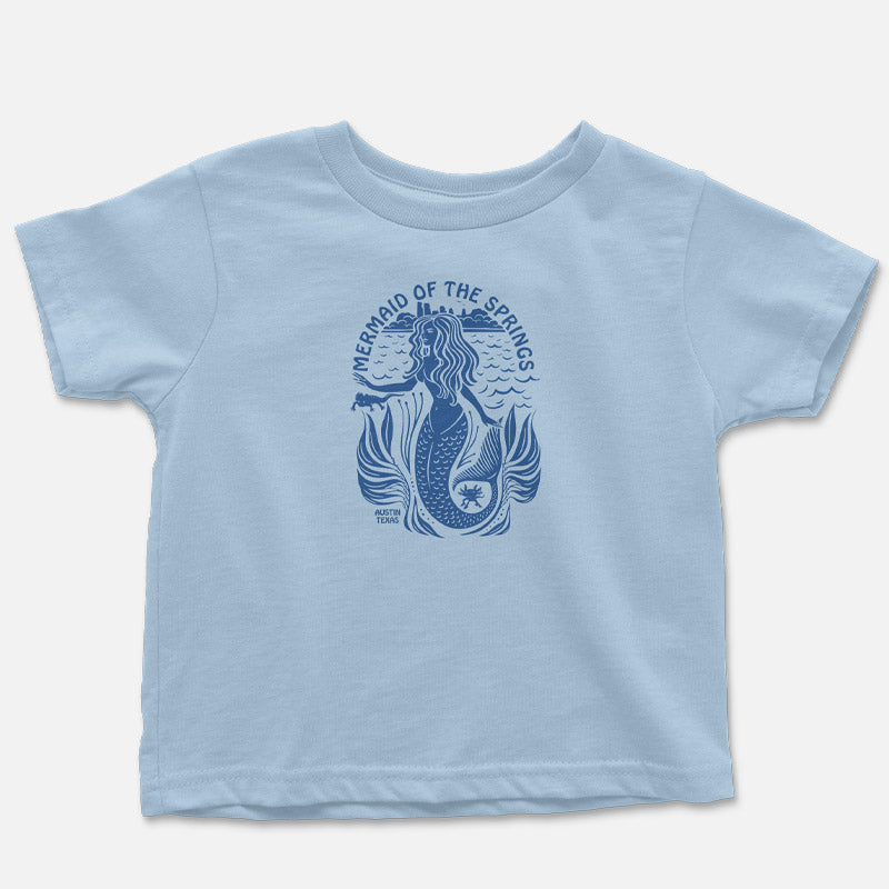 Light blue t-shirt with a mermaid graphic on a white background