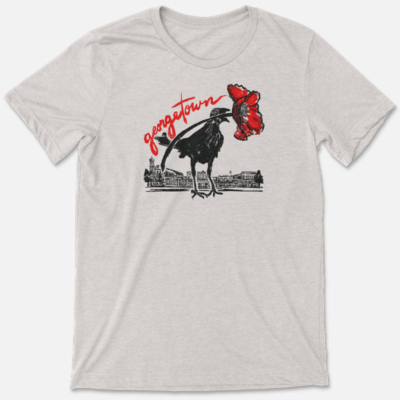 Red Poppy Georgetown, Texas Grackle T-shirt featuring a design of a red poppy, a grackle and the Georgetown Square.