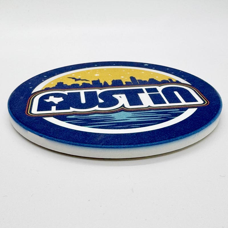 Coaster with 'Austin' design on a white background