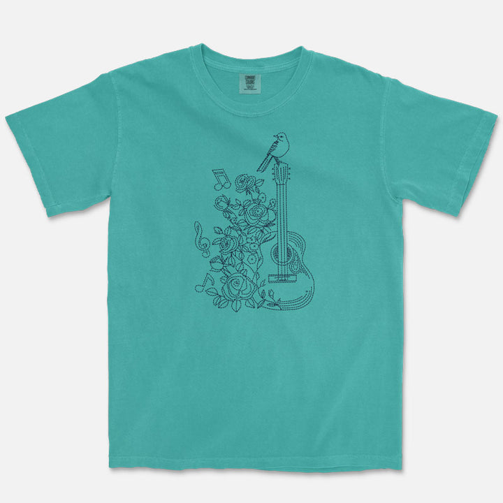 Stitch guitar graphic t-shirt printed on a Seafoam Comfort Colors garment-dyed tee
