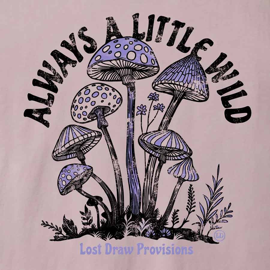 A close-up of a graphic print on a light pink fabric, featuring purple and black illustrated mushrooms with the text &