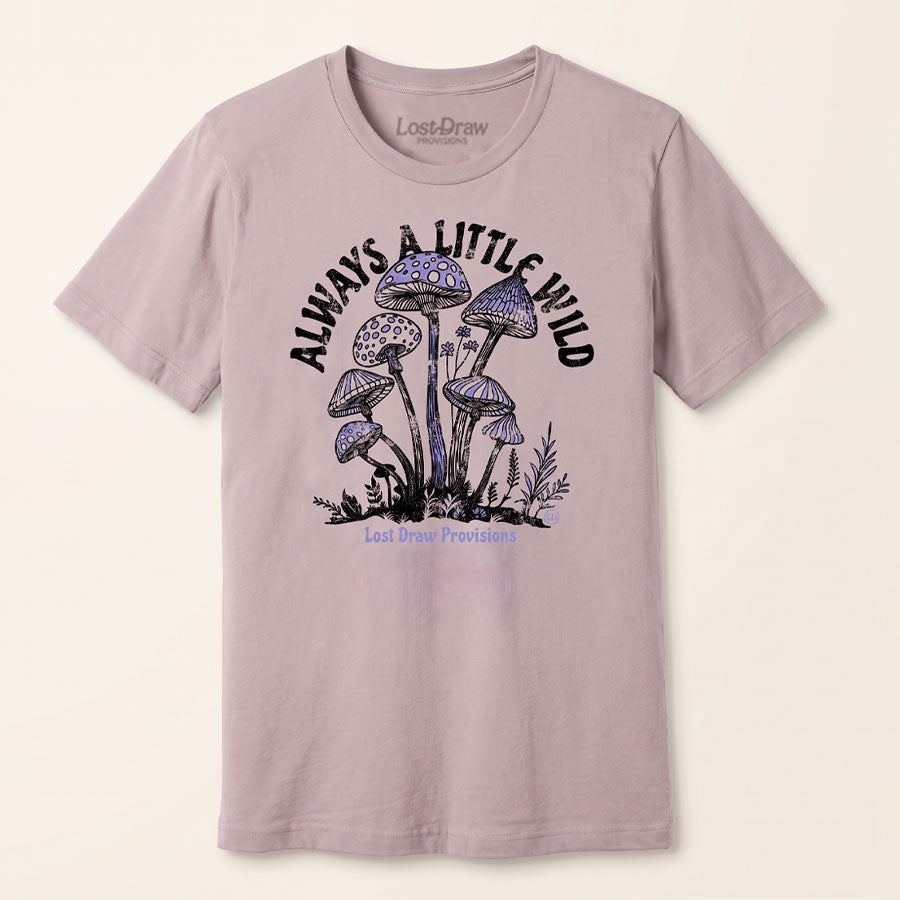 A light dusty pink t-shirt with a graphic of purple mushrooms and the text &