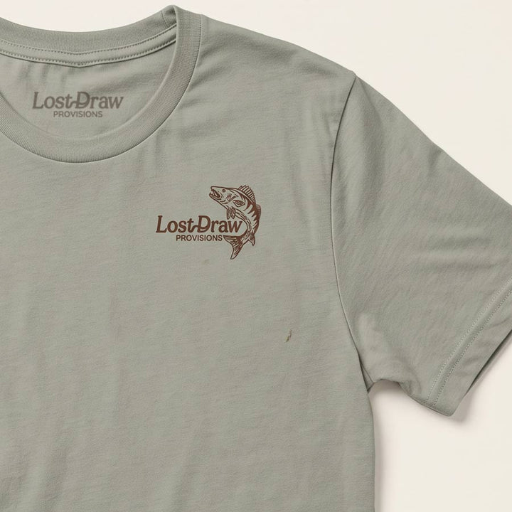 Cold Water Club Tee in Thyme green with small Lost Draw Provisions fish logo on front left chest.
