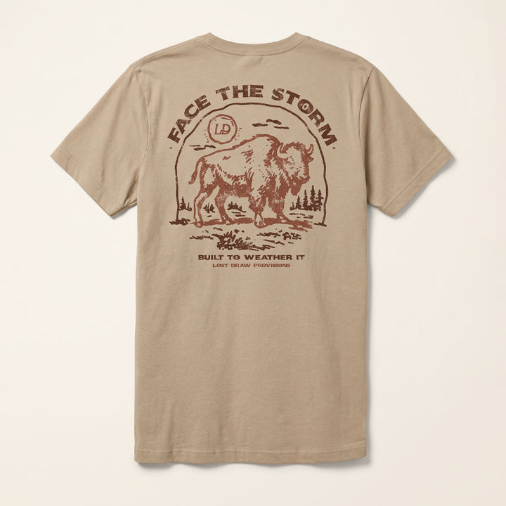 Back of the Tan Face the Storm Tee featuring a distressed vintage buffalo illustration and Built to Weather It lettering.