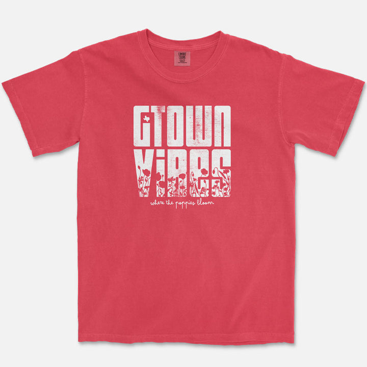 Paprika Georgetown Texas t-shirt featuring oversized retro “Georgetown Vibes” lettering filled with blooming poppy flowers and the phrase “where the poppies bloom."