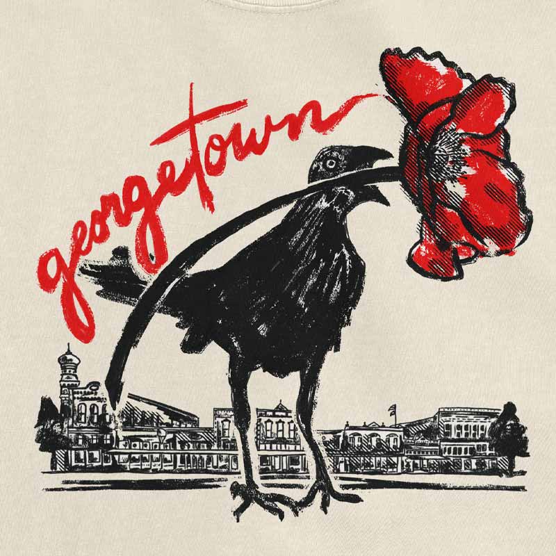 Close-up of red poppy and grackle graphic on ivory Comfort Colors Georgetown shirt