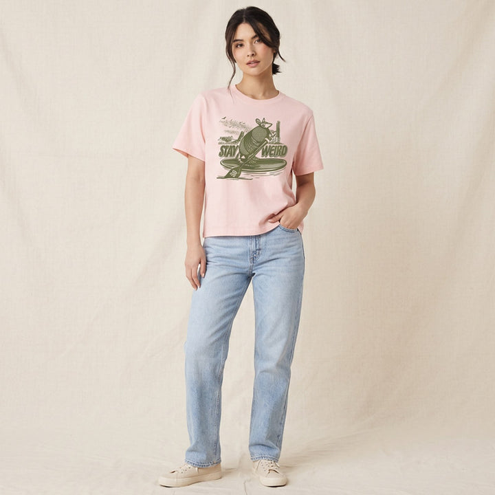 Lifestyle image of woman wearing relaxed fit Austin armadillo graphic tee